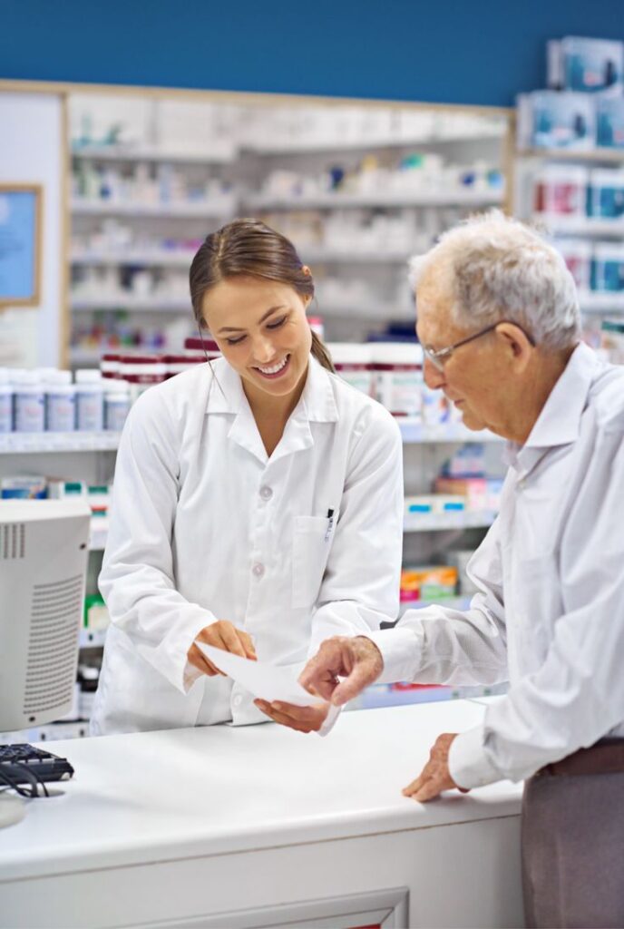Pharmacist providing medicine advice at The Pharmacy Whitwell